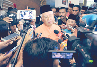 Najib vows to cooperate